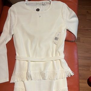 White knit 2 piece suit size PM, it’s vey stretchy and made with 100% Acrylic